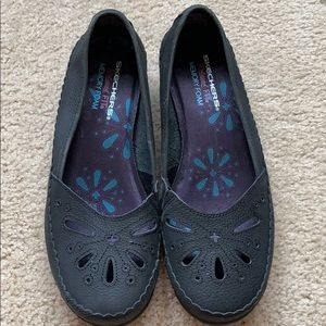 Black Sketchers with slight heel